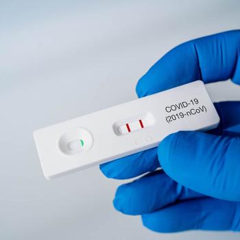 PCR test in a gloved hand